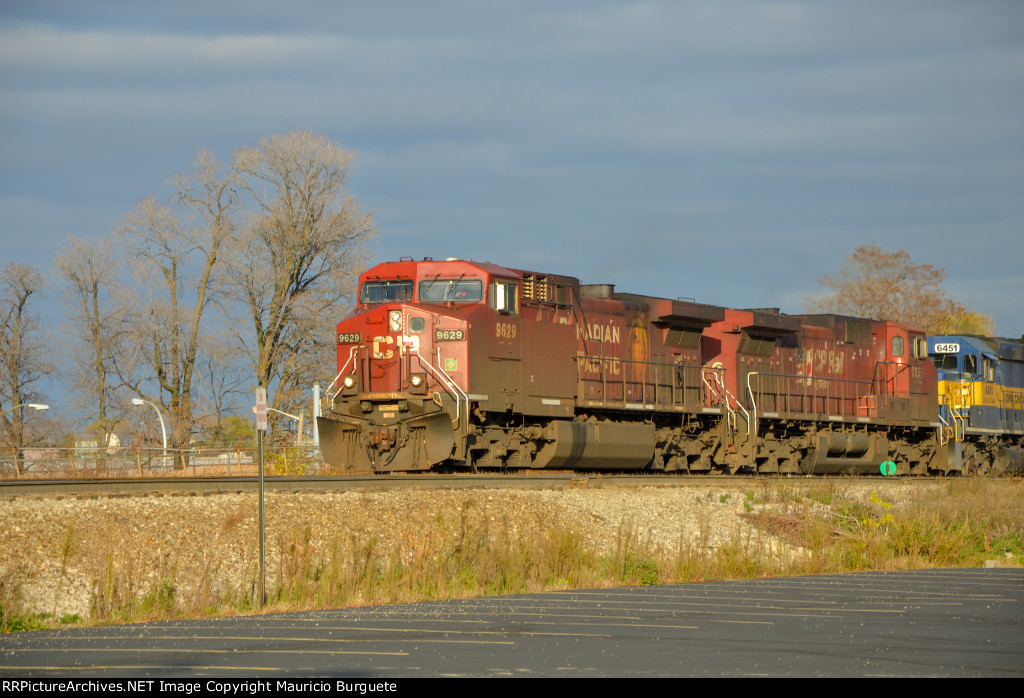 CP AC44CW Locomotives leading a train